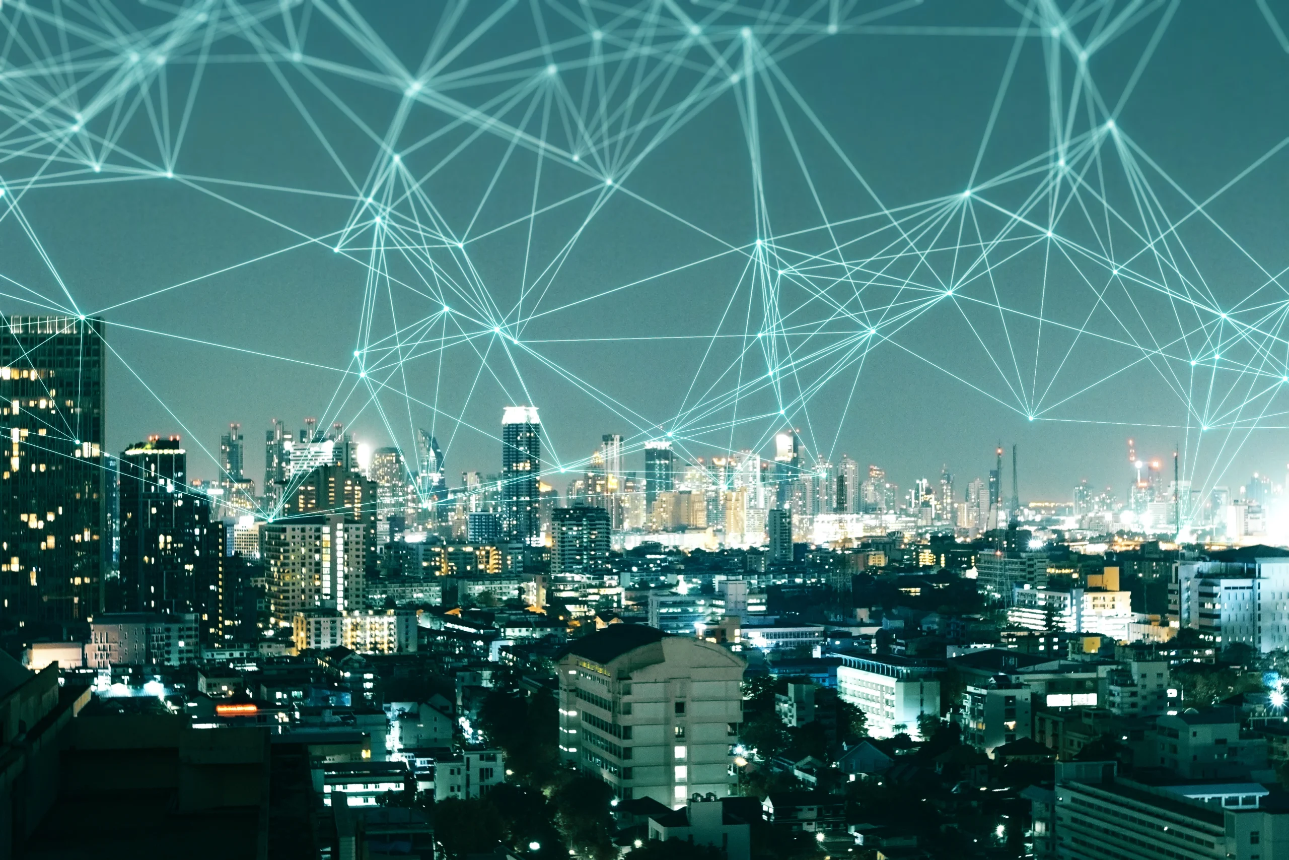 Nighttime cityscape covered by a glowing green digital mesh highlighting SD-WAN deployment failure