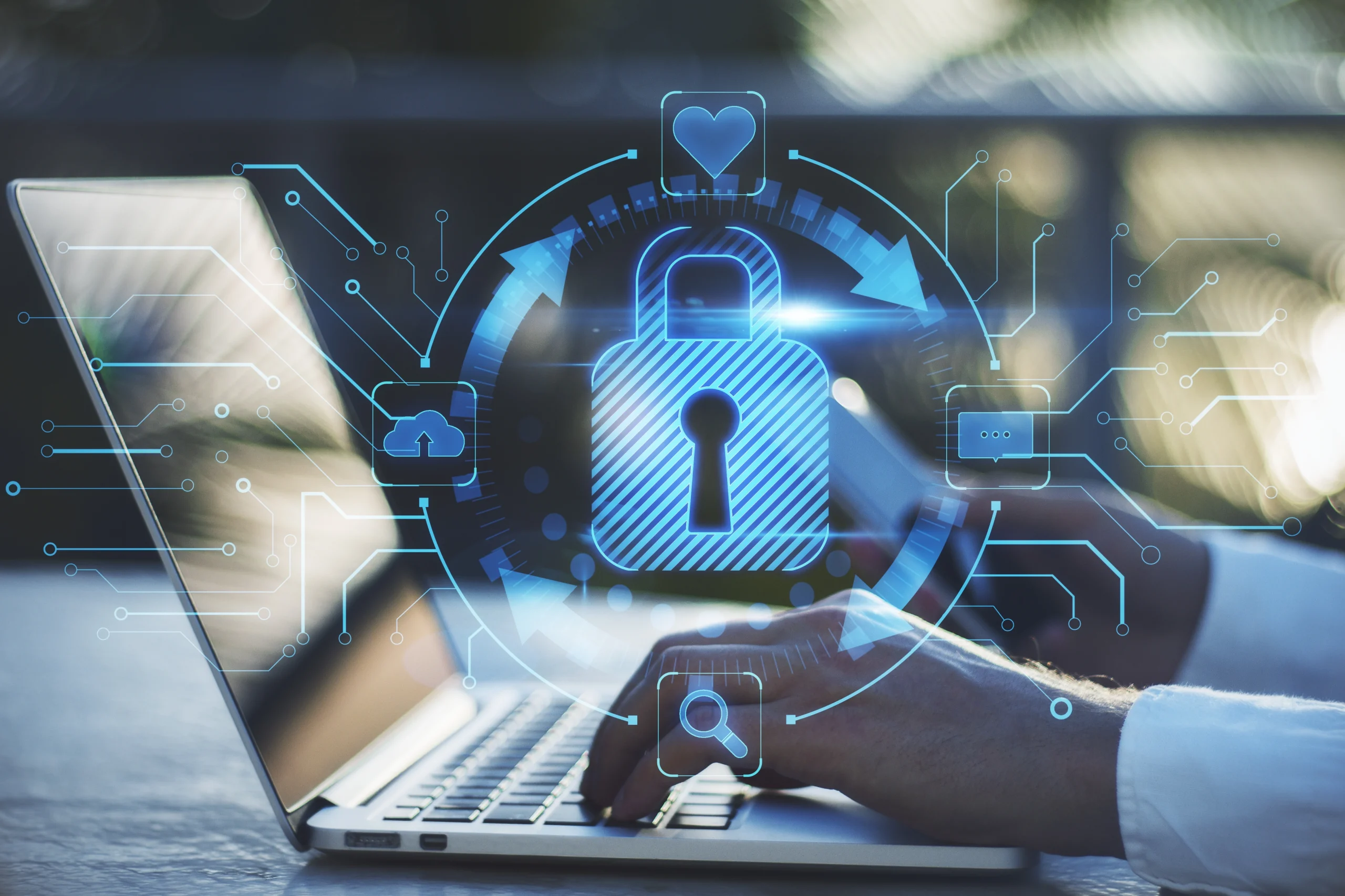 Professional typing on a laptop protected by a glowing digital padlock and vendor-agnostic cybersecurity