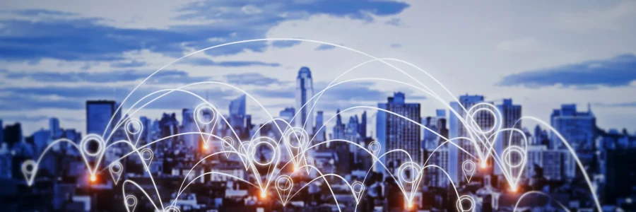 Illuminated city skyline with glowing network nodes representing agnostic last-mile connectivity