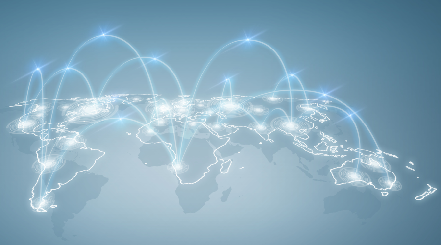 Glowing blue digital world map showing global network nodes to illustrate business internet latency causes. 