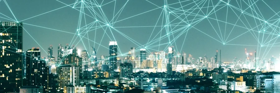 Nighttime cityscape covered by a glowing green digital mesh highlighting SD-WAN deployment failure